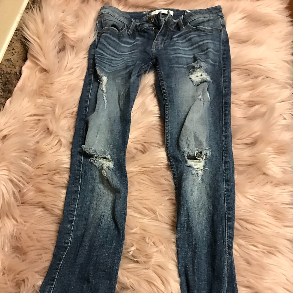 Distressed light washed jeans